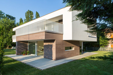 Mid-sized minimalist white two-story stucco house exterior photo in Other