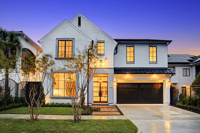 Example of a mid-sized trendy two-story house exterior design in Houston