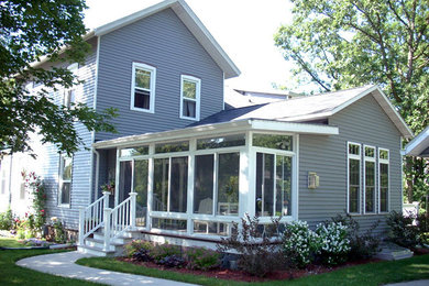 Mid-sized craftsman two-story vinyl exterior home idea in Milwaukee