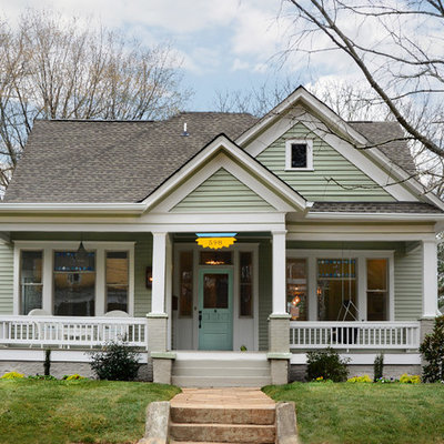 Inspiration for a mid-sized timeless two-story wood exterior home remodel in Atlanta with a shingle roof