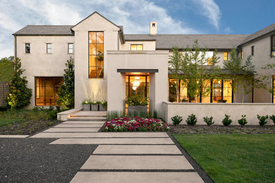 Transitional beige two-story house exterior photo in Dallas