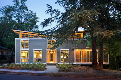 Example of a mid-sized trendy gray two-story wood exterior home design in Atlanta