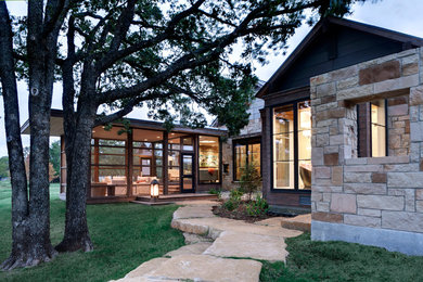 Inspiration for a rustic exterior home remodel in Dallas