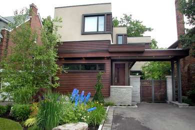 Example of a trendy exterior home design in Toronto
