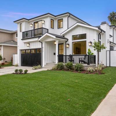 Transitional white two-story exterior home photo in Los Angeles
