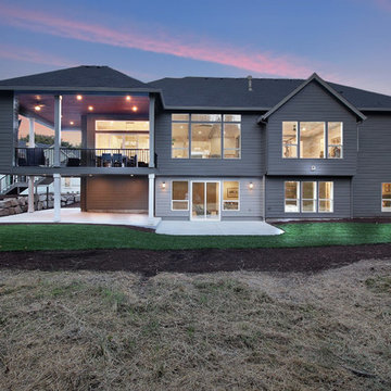 Rear of Home at Dusk - The Genesis - Family Super Ranch with Daylight Basement