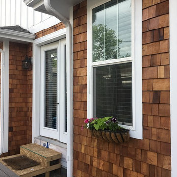 Rebuild Custom Porch and add cedar shake siding around home