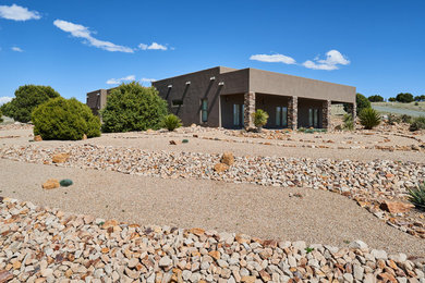 Example of an exterior home design in Albuquerque