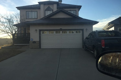 Photo of a large rustic garage in Edmonton.