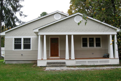 Example of an arts and crafts exterior home design in Bridgeport