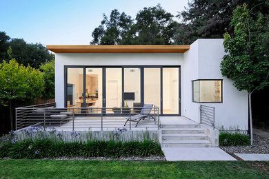 Inspiration for a small modern white one-story flat roof remodel in San Francisco