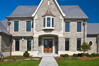 Elegant stone exterior home photo in Philadelphia