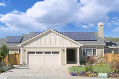 Example of a mid-sized minimalist beige one-story stucco exterior home design in San Francisco with a shingle roof