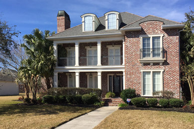 Example of an arts and crafts exterior home design in New Orleans