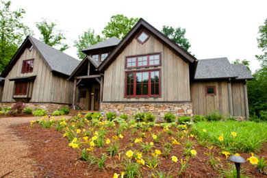 Mid-sized mountain style brown two-story wood gable roof photo in Little Rock