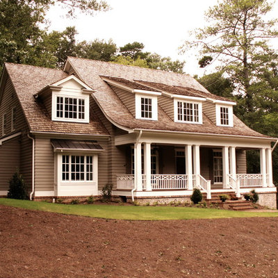 Inspiration for a mid-sized timeless gray two-story vinyl exterior home remodel in Atlanta with a shingle roof