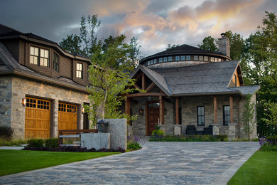Example of an arts and crafts exterior home design in Toronto