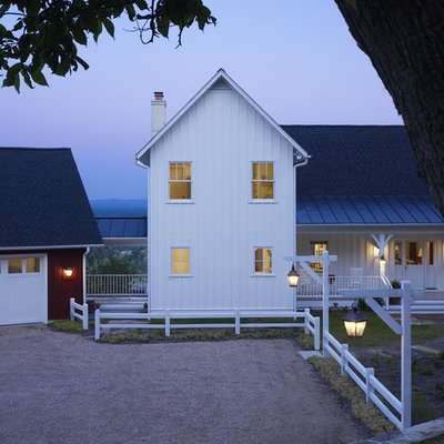 Cottage white two-story wood exterior home photo in DC Metro