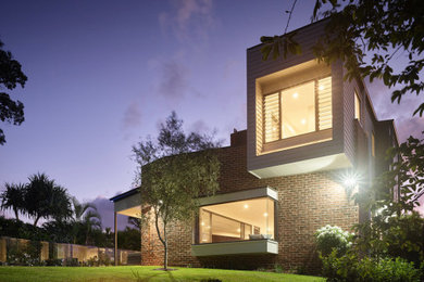 Modelo de fachada de casa contemporánea de dos plantas