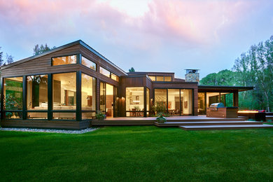 Inspiration for a contemporary brown house exterior remodel in Denver