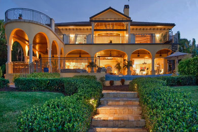 Example of a tuscan exterior home design in Tampa