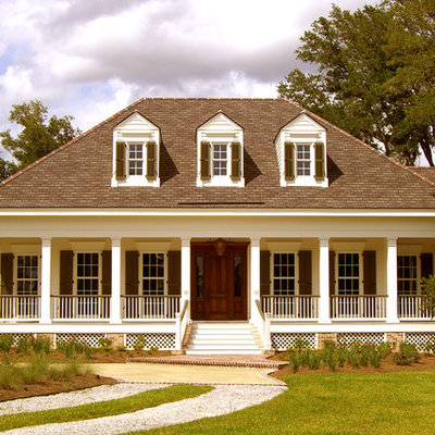 Example of a classic wood exterior home design in New Orleans