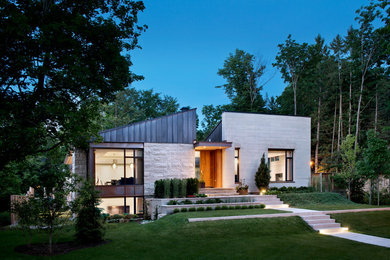 Inspiration for a contemporary two-story exterior home remodel in Ottawa
