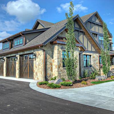 Inspiration for a timeless mixed siding exterior home remodel in Calgary