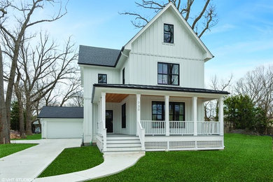 Large farmhouse white three-story concrete fiberboard exterior home idea in Chicago with a shingle roof