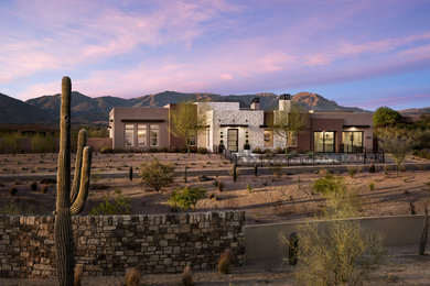 Example of a southwest exterior home design in Phoenix