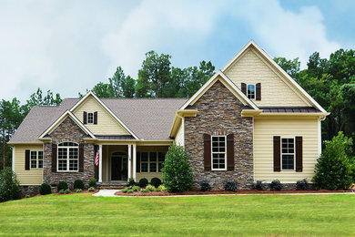 Brown one-story exterior home photo in Charlotte