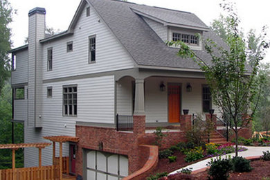Craftsman gray three-story mixed siding exterior home idea in Atlanta with a shed roof