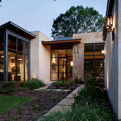Trendy mixed siding exterior home photo in Dallas