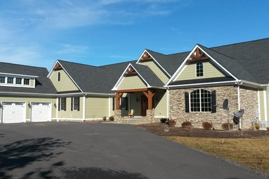 Example of a mountain style two-story house exterior design in DC Metro