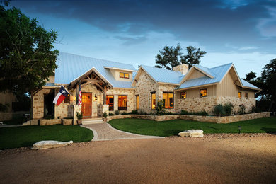 Example of a cottage exterior home design in Austin