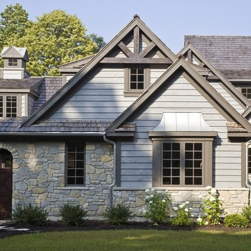 Rustic Style House with Wilsey Bay Stone and Bluestone Stained Cedar Siding