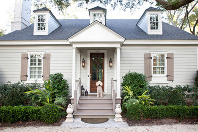 Design ideas for a large and white classic two floor detached house in Atlanta with vinyl cladding, a hip roof and a shingle roof.