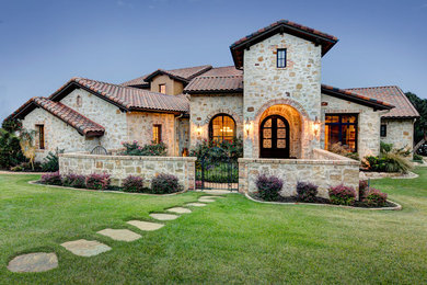 Inspiration for a mediterranean exterior home remodel in Austin