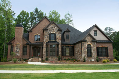 Beige traditional render house exterior in Other.