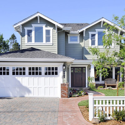 Example of an arts and crafts wood exterior home design in San Francisco