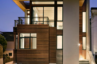 This is an example of a contemporary house exterior in San Francisco with wood cladding.