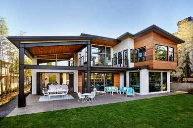 Large modern two-story mixed siding exterior home idea in Portland