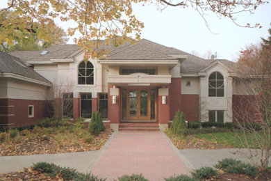 Photo of a white traditional two floor detached house in Detroit.