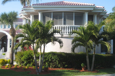 Design ideas for a bohemian house exterior in Miami.