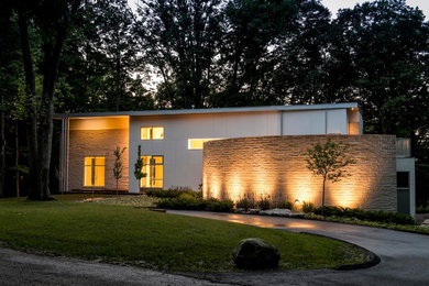 Example of a minimalist two-story mixed siding exterior home design in Indianapolis