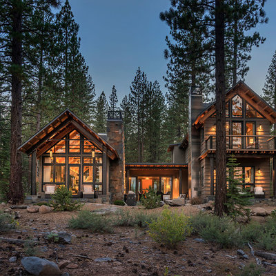 Example of a large mountain style brown two-story wood gable roof design in Sacramento