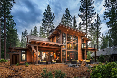 Mid-sized mountain style brown two-story wood exterior home photo in Sacramento