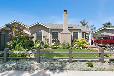 Large traditional green one-story stucco exterior home idea in San Francisco with a shingle roof