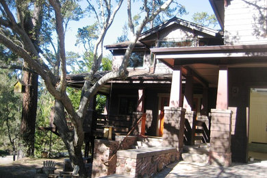 Inspiration for a large craftsman brown two-story wood exterior home remodel in San Luis Obispo with a hip roof