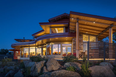 Large trendy three-story mixed siding exterior home photo in Denver